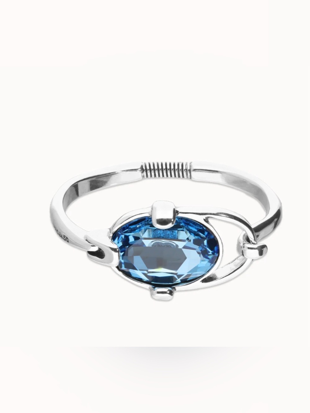 Uno de 50 bangle bracelet with faceted blue crystal